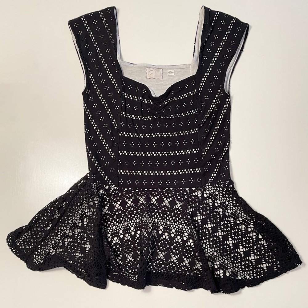 Black lace fitted sleeveless top, dress up or down. Flattering.